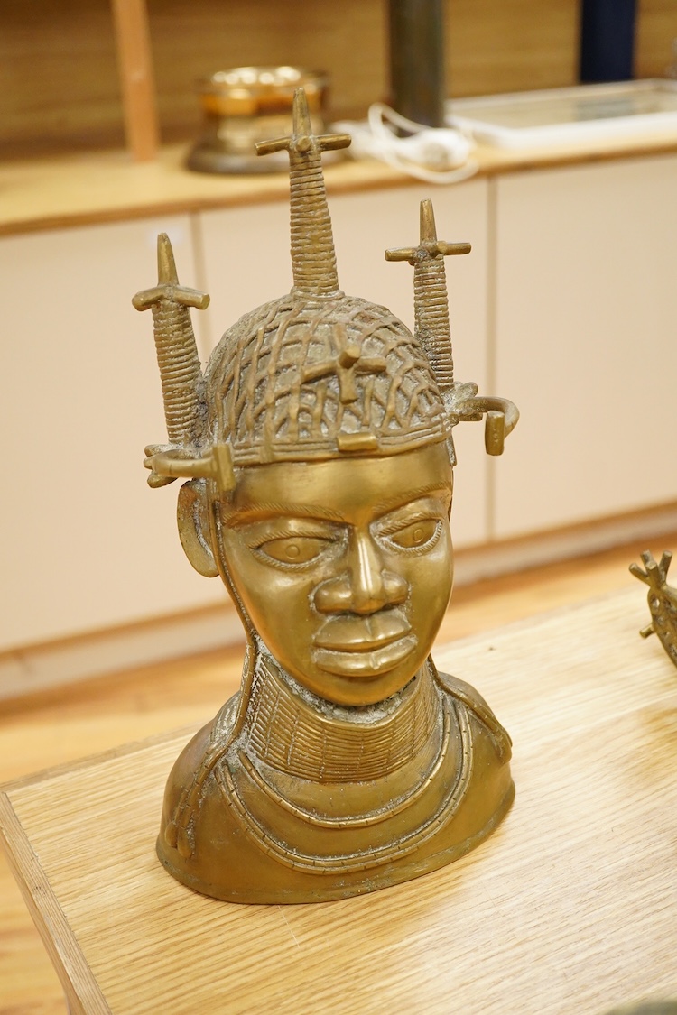 Three Benin type bronzes to include a bust, largest 47cm high